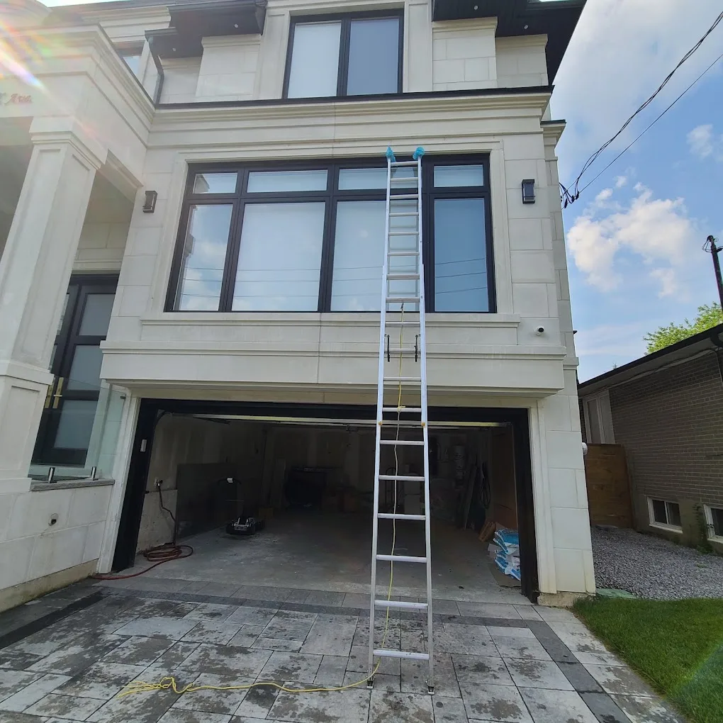 Exterior access for second-storey glass